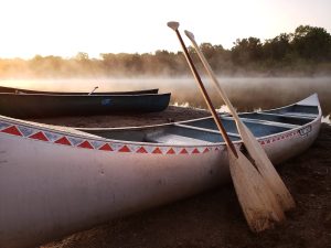 aluminum canoe with paddles