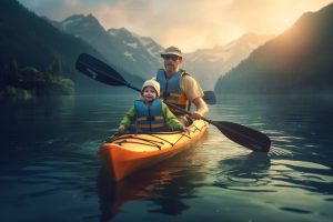 a father kayaking with his son 