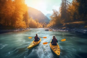 two women kayakers on the river 