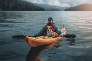 a man kayaking with his dog